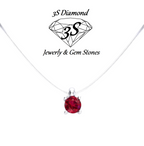 ciondolo punto  luce in oro bianco 18k e rubino naturale 0,50 ct