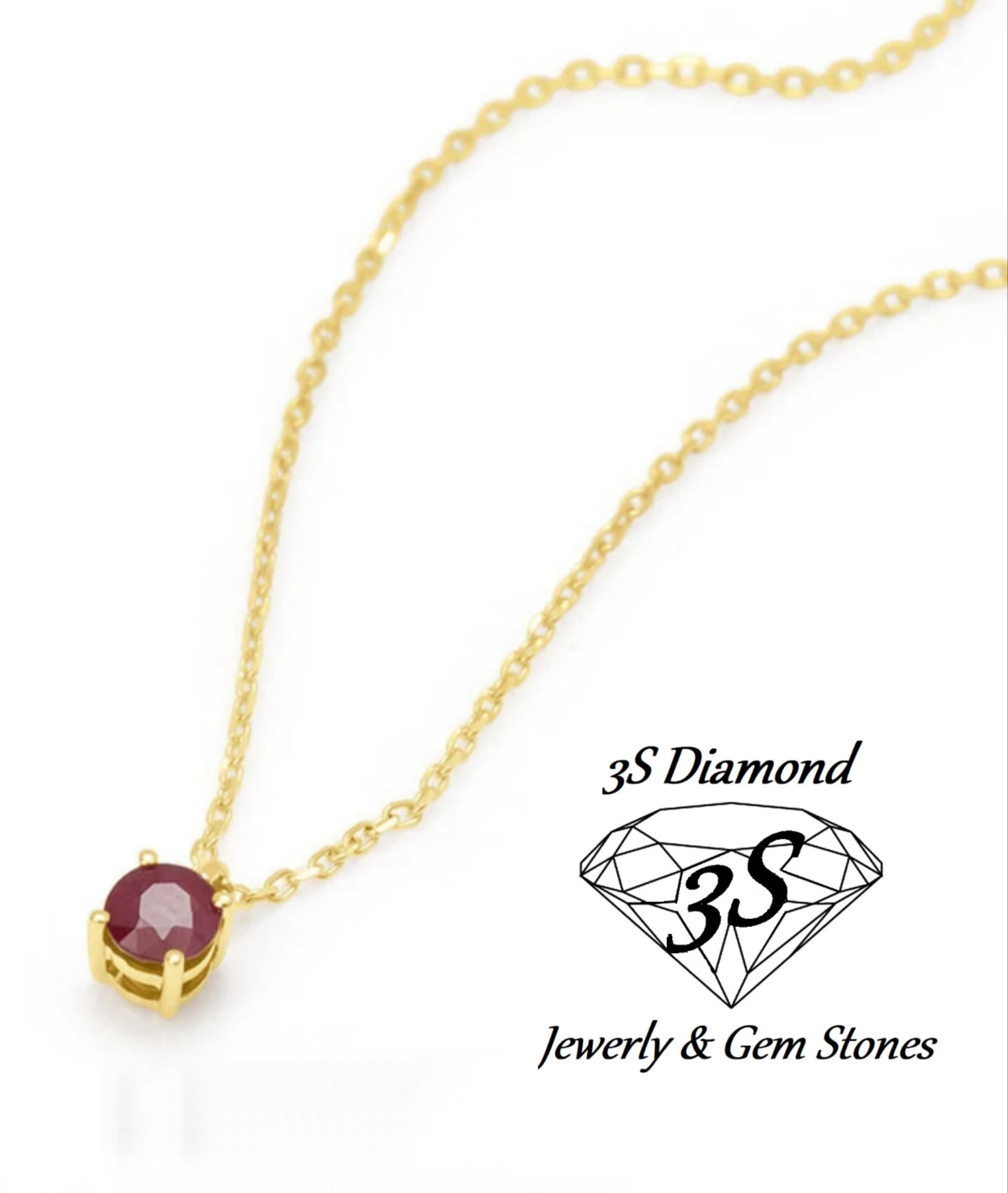 ciondolo punto  luce in oro bianco 18k e rubino naturale 0,50 ct