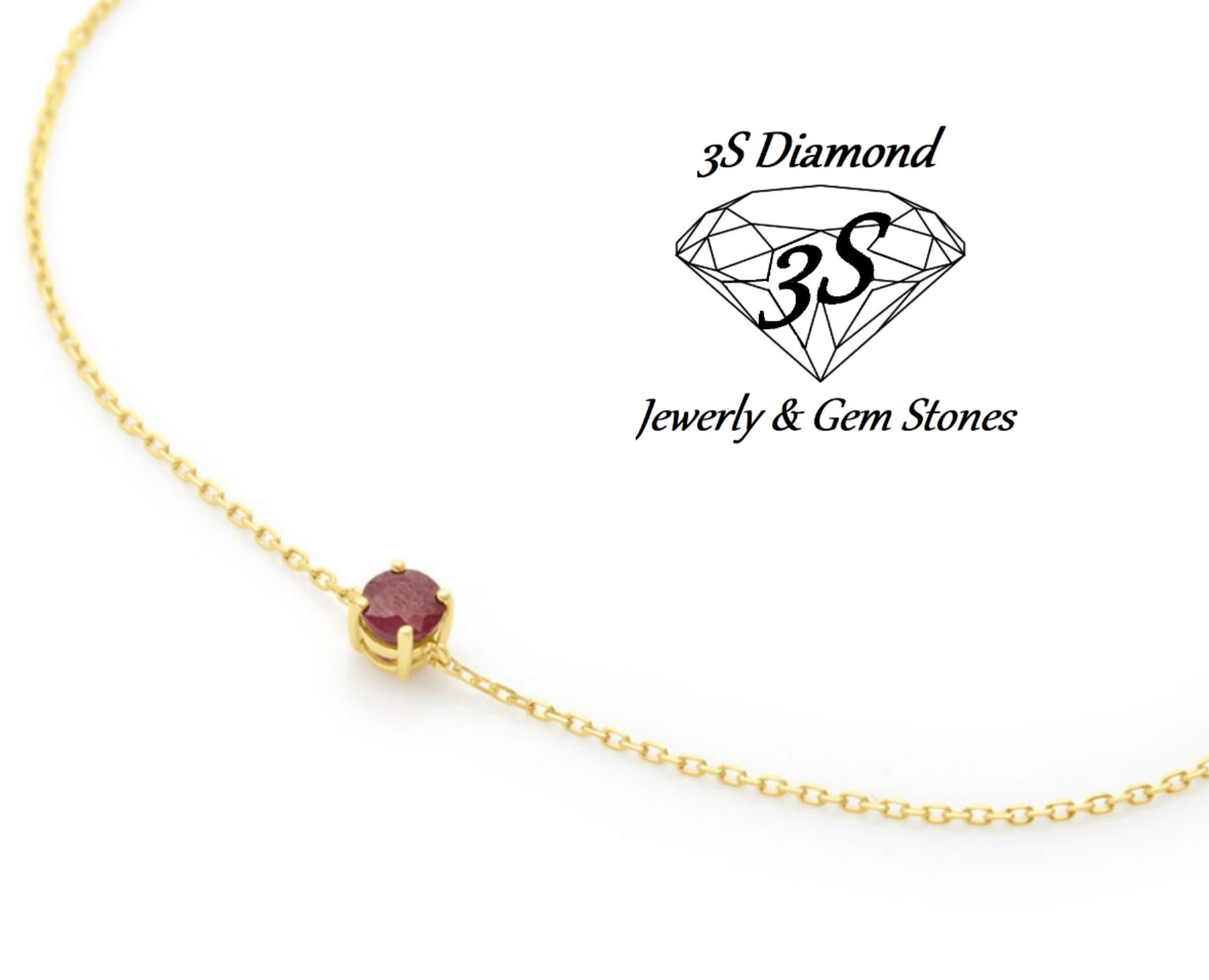 ciondolo punto  luce in oro bianco 18k e rubino naturale 0,50 ct