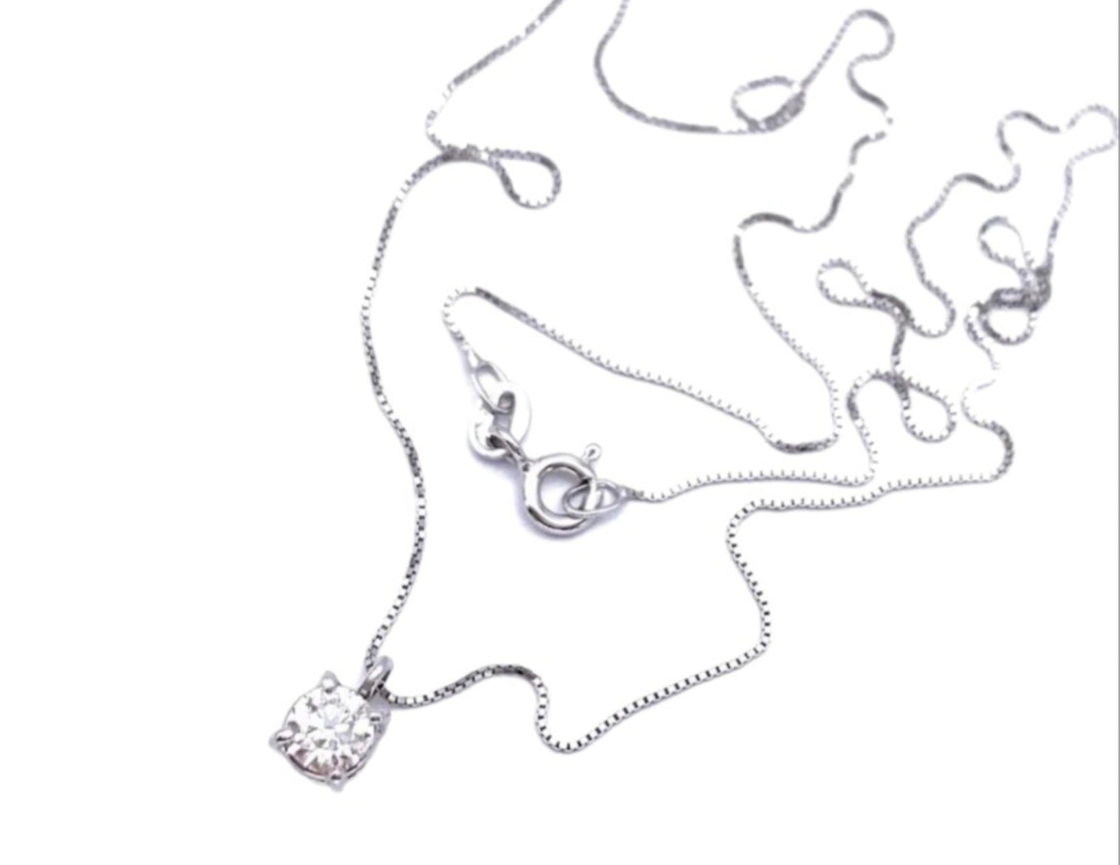 ciondolo punto luce certificato HRD In oro bianco e diamante naturale 0,15ct