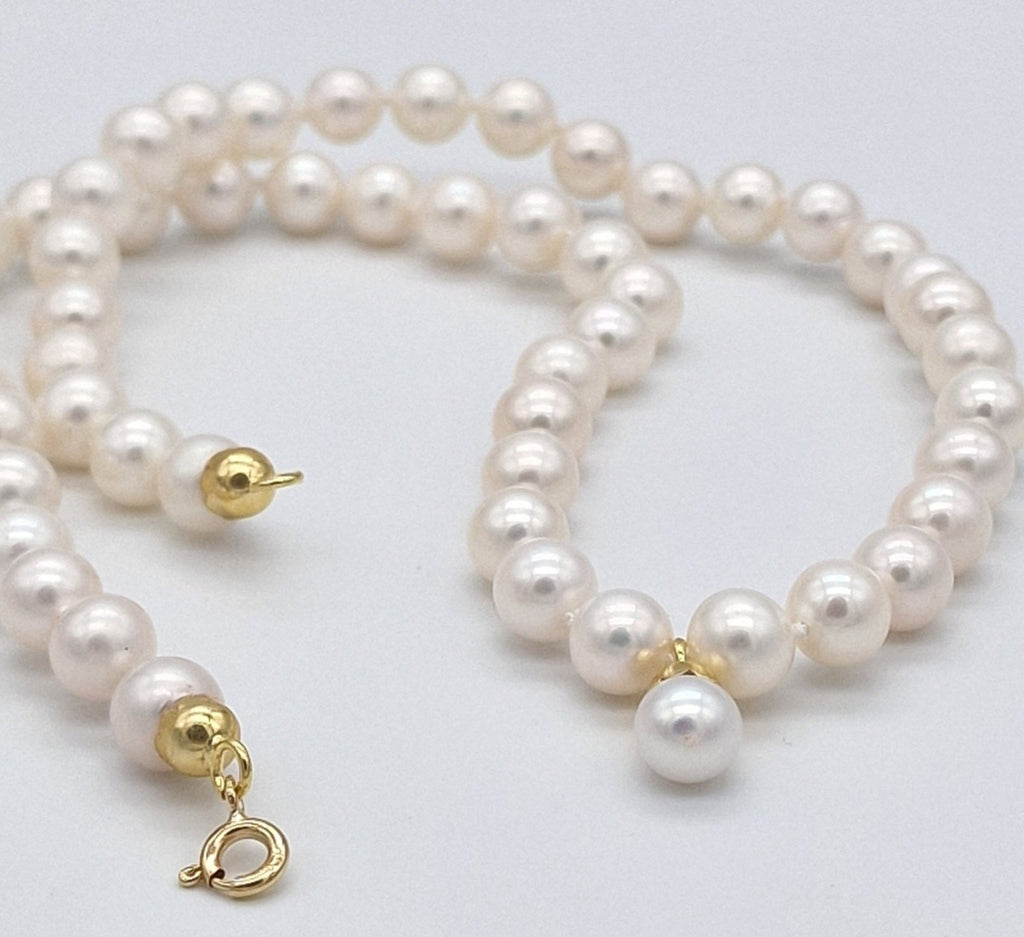 Collana in oro giallo 18k e perle naturale akoya