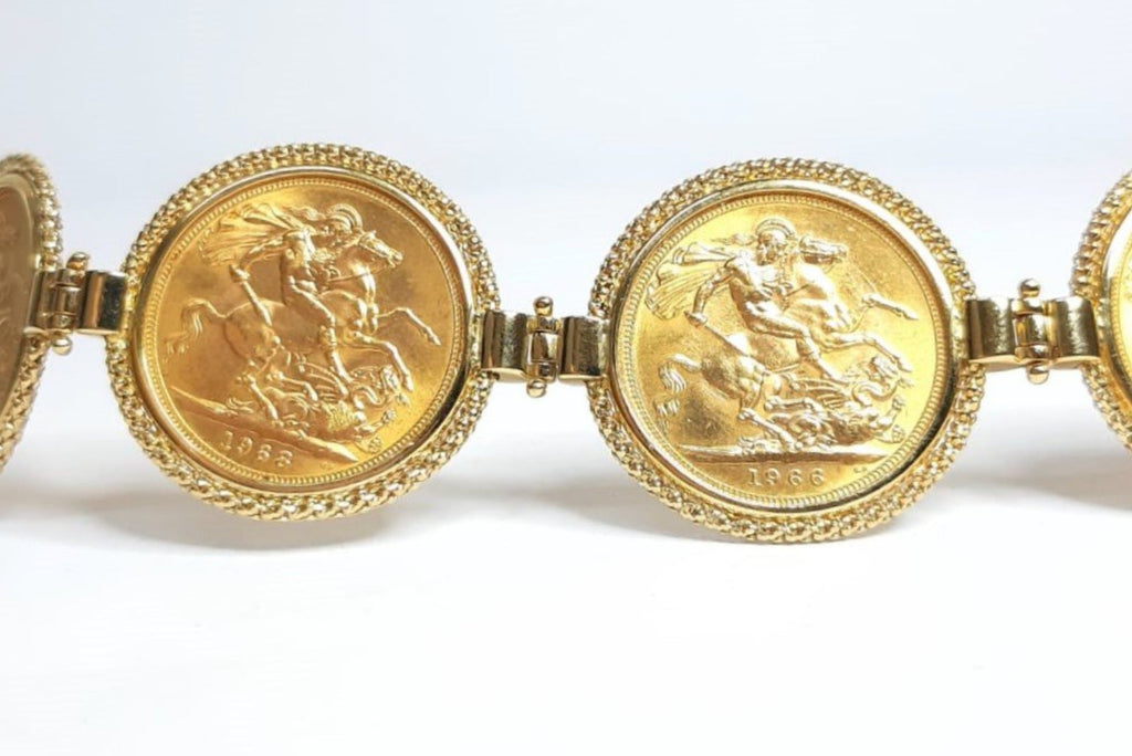 Bracciale in oro giallo con 6 sterline oro 22k