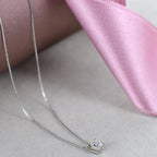 ciondolo punto luce quadrato  in oro bianco e diamanti naturale  0,25 ct