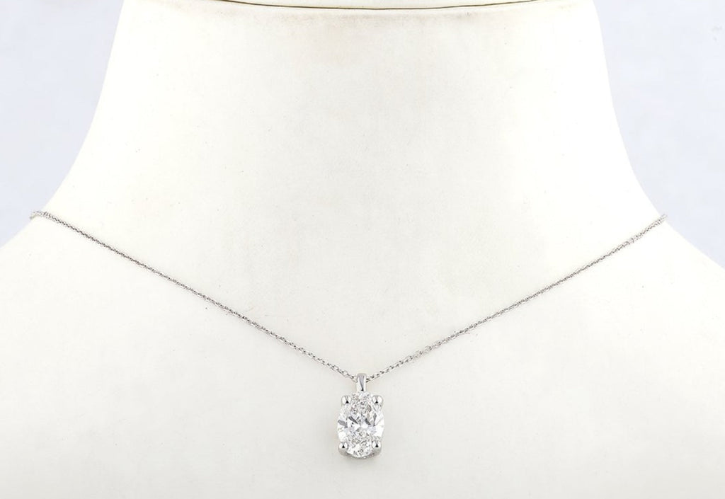 Collana punto luce in oro e diamante naturale ovale 0.50ct