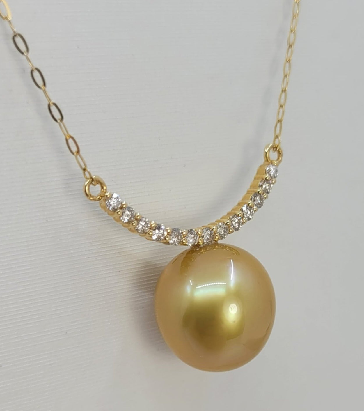 Collana in oro 18k e diamanti naturali 0.30ct  e perle australiana 10mm