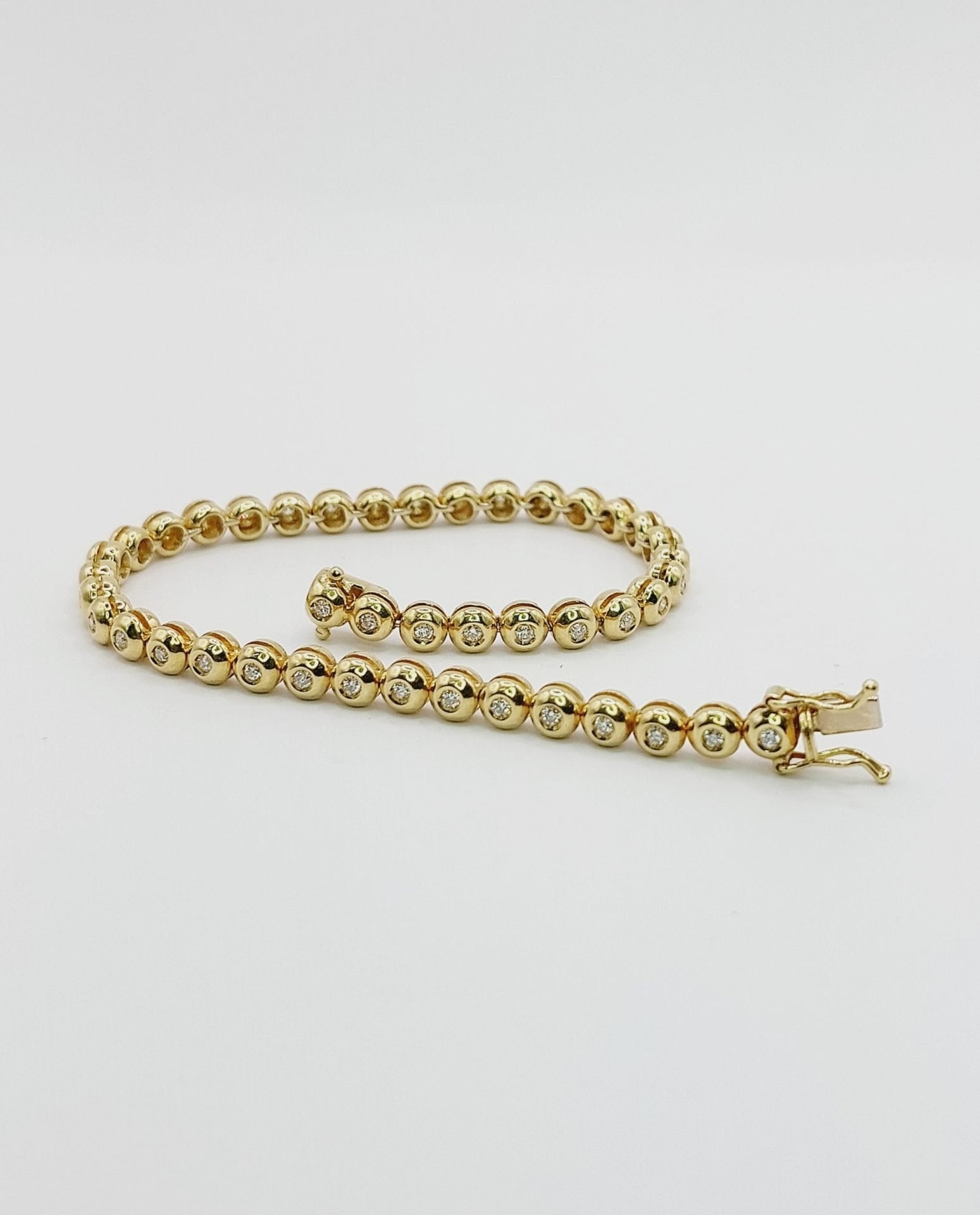 bracciale tennis a cipollina in oro bianco 18k e diamanti naturali 3,80ct