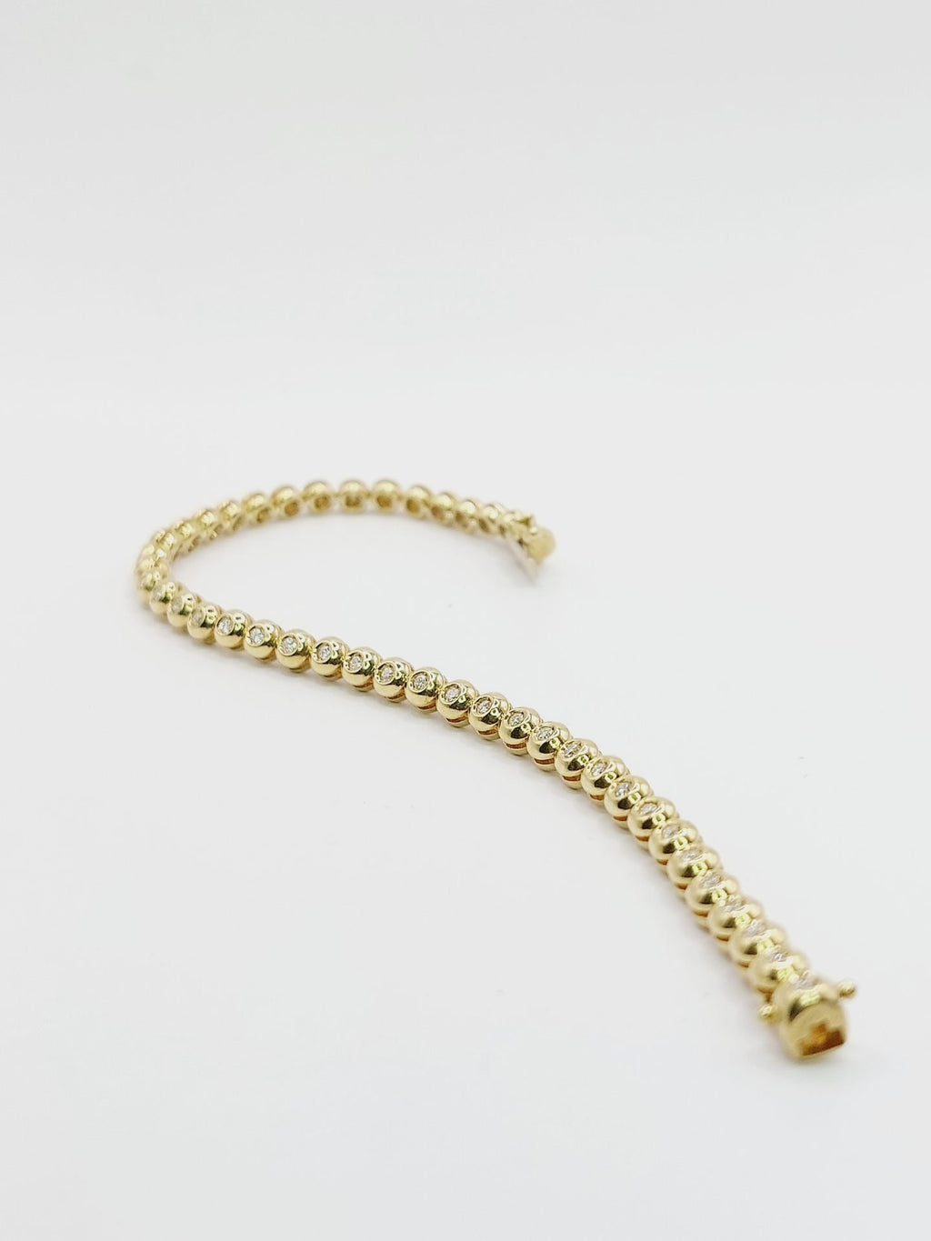 bracciale tennis a cipollina in oro bianco 18k e diamanti naturali 1,5 ct