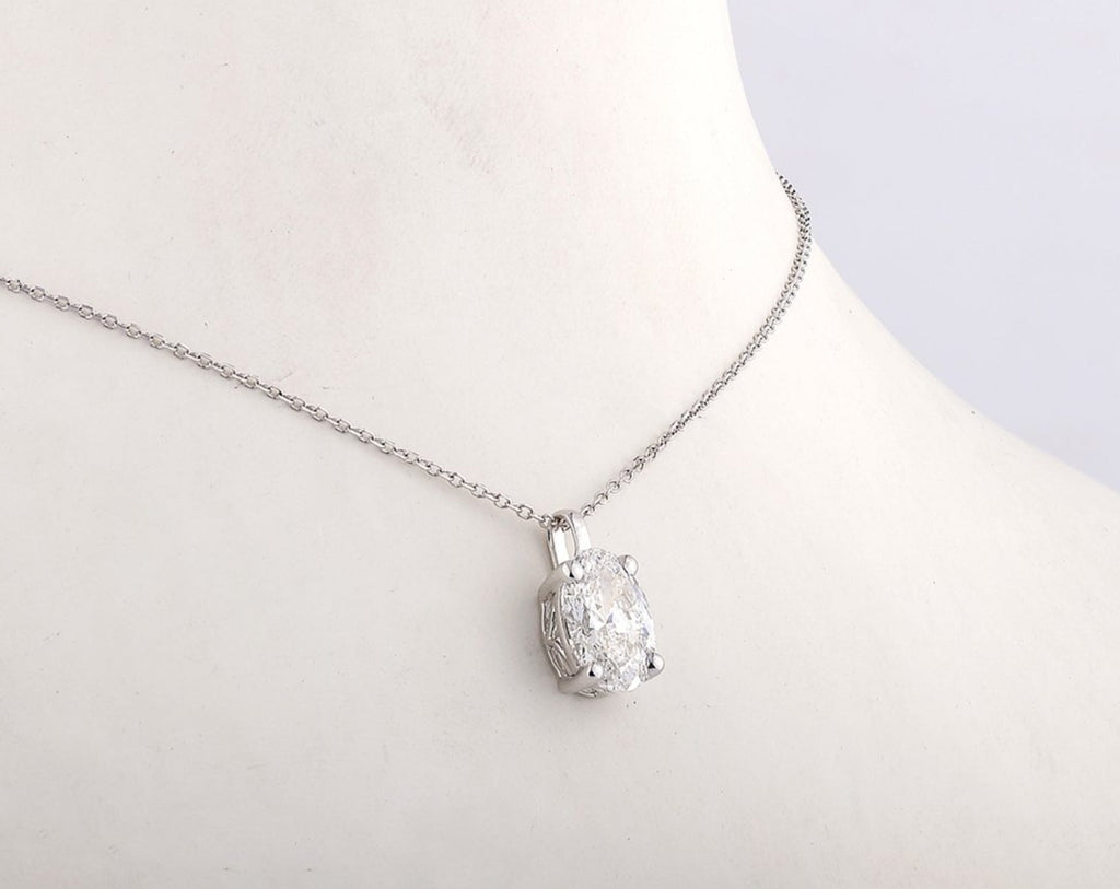 Collana punto luce in oro e diamante naturale ovale 0.50ct