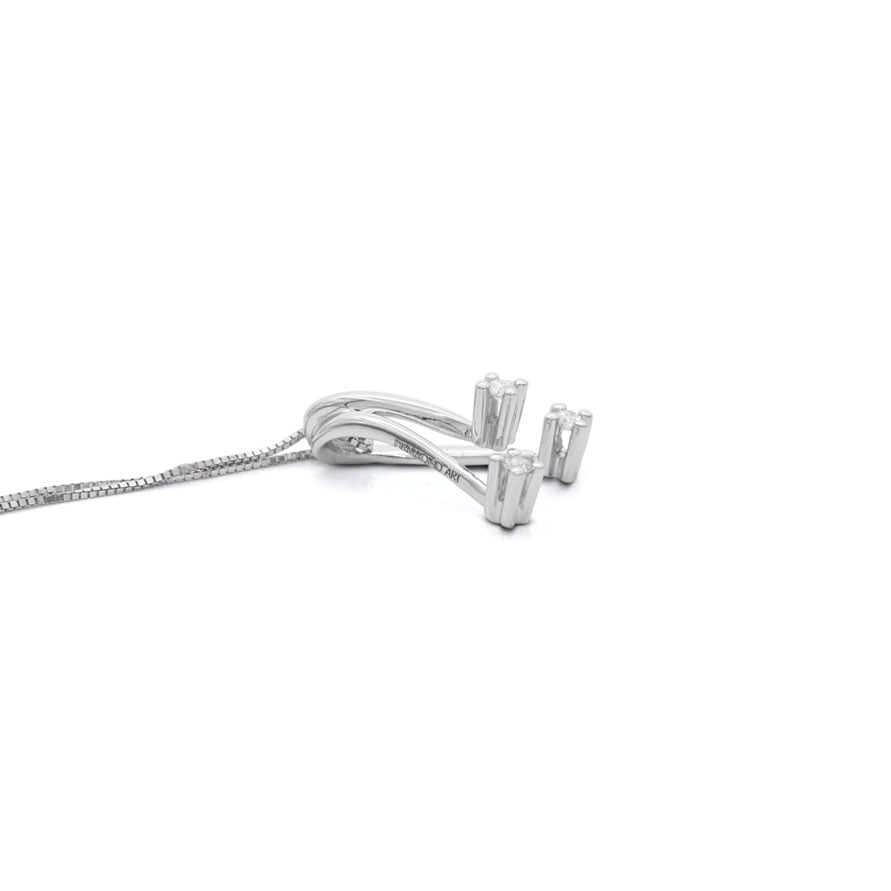 Collana con pendente trilogy con 0.30ct Diamanti Naturali  in oro bianco 18kt