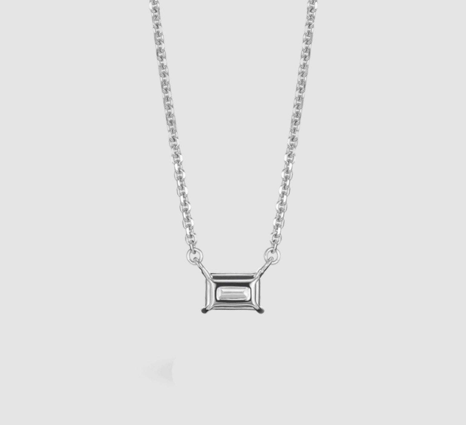 Collana punto luce in oro e diamante naturale smeraldo 0.22ct