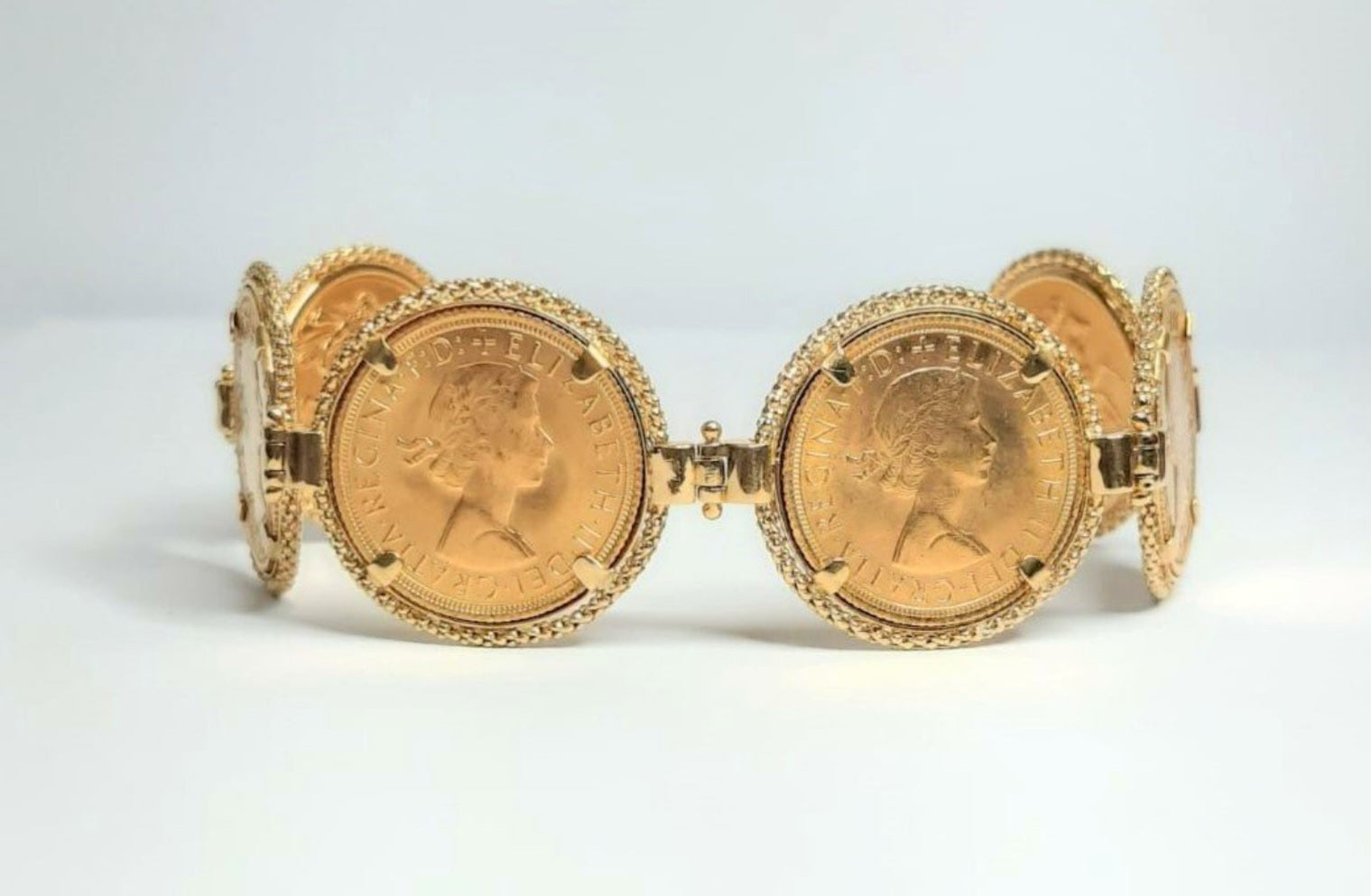 Bracciale in oro giallo con 6 sterline oro 22k