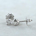 Orecchini punto luce certificato HRD in oro bianco 18k  con 2 diamanti naturali 1,00 ct