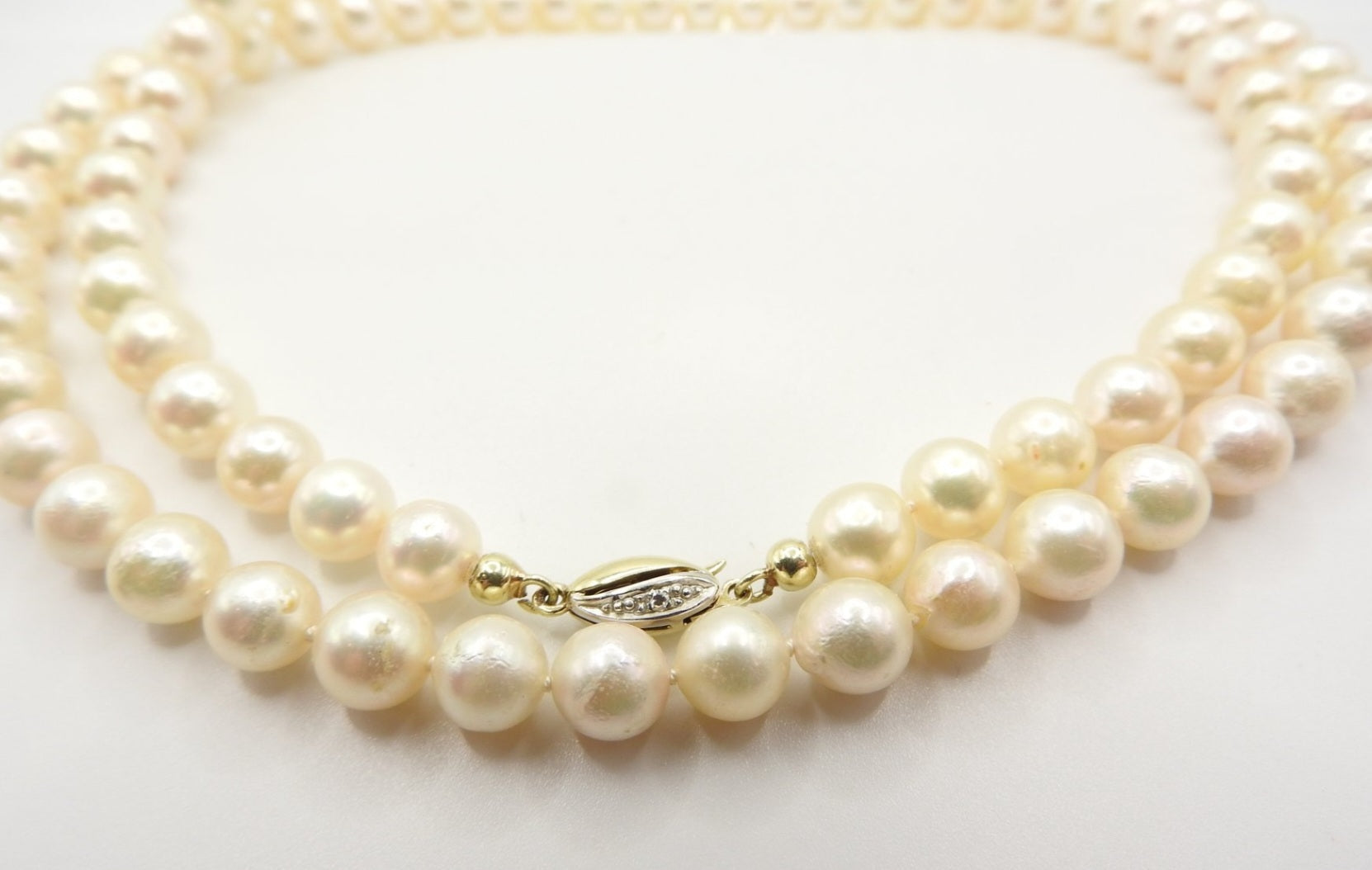 Collana in oro bianco 18k e perle naturale akoya e diamanti naturali
