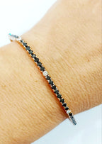 bracciale tennis in oro giallo 18k e diamanti naturali neri  4,00ct