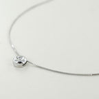 ciondolo punto luce  a cipollina in oro bianco 18k e diamante naturale  0,30 ct