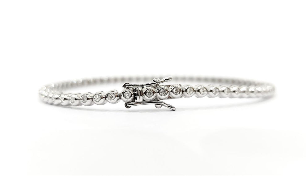bracciale tennis a cipollina in oro bianco 18k e diamanti naturali 1,5 ct