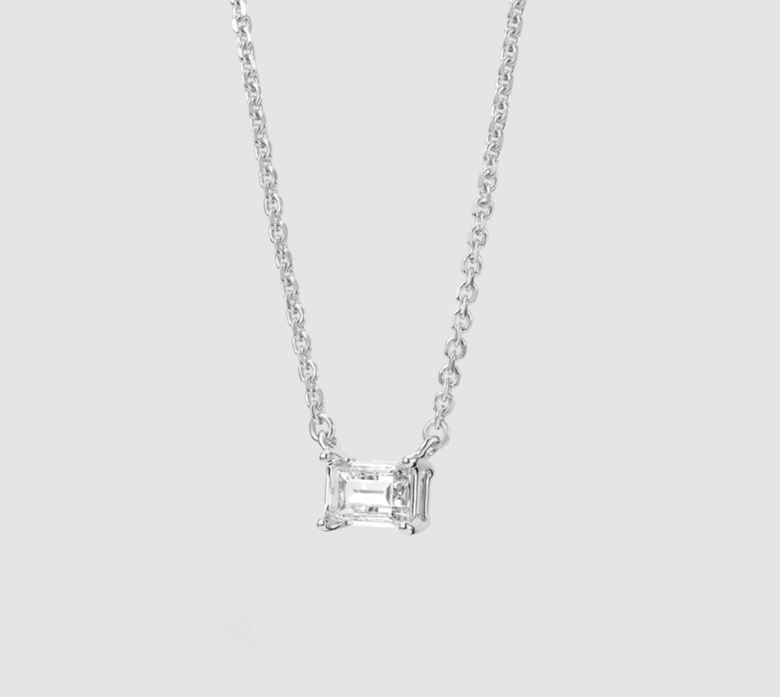 Collana punto luce in oro e diamante naturale smeraldo 0.22ct