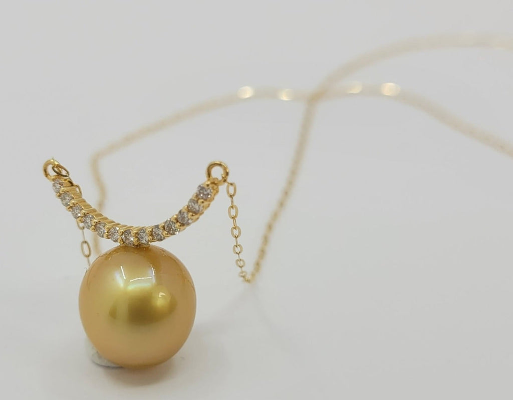 Collana in oro 18k e diamanti naturali 0.30ct  e perle australiana 10mm