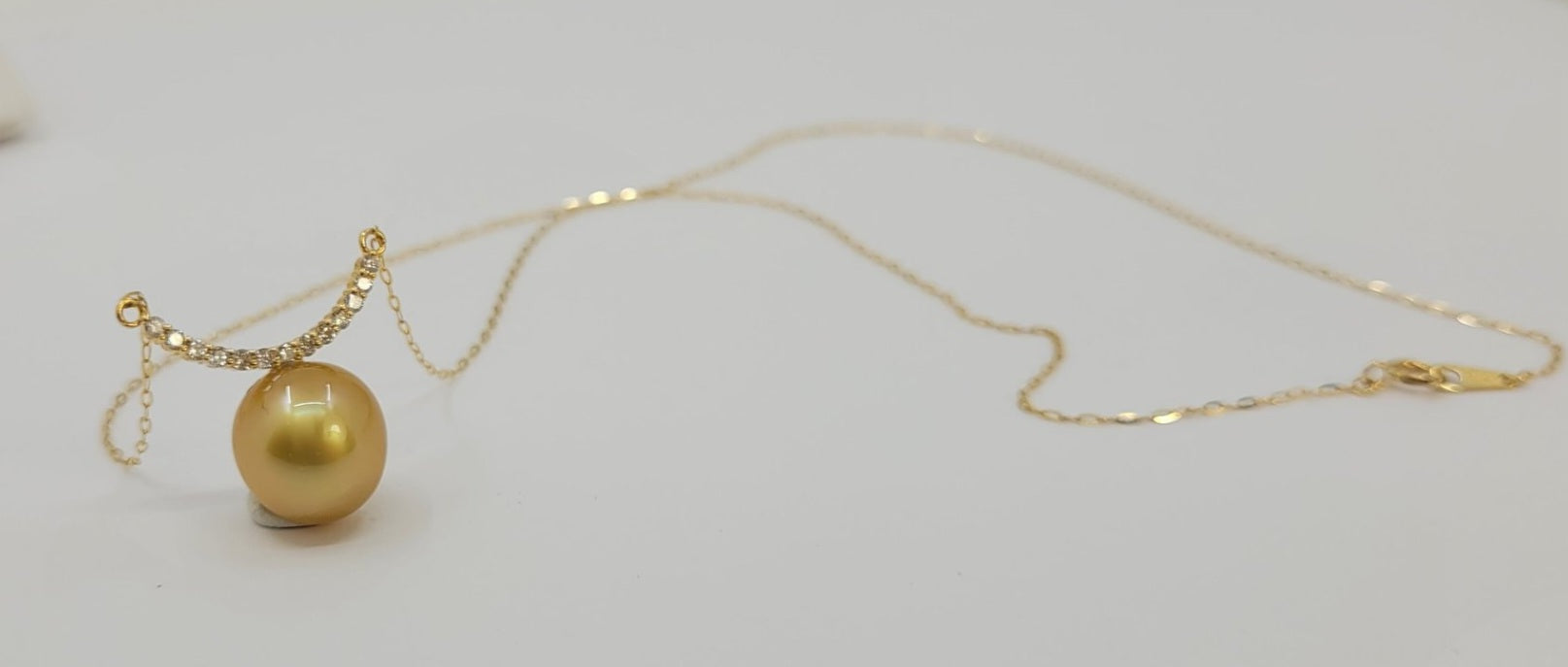 Collana in oro 18k e diamanti naturali 0.30ct  e perle australiana 10mm