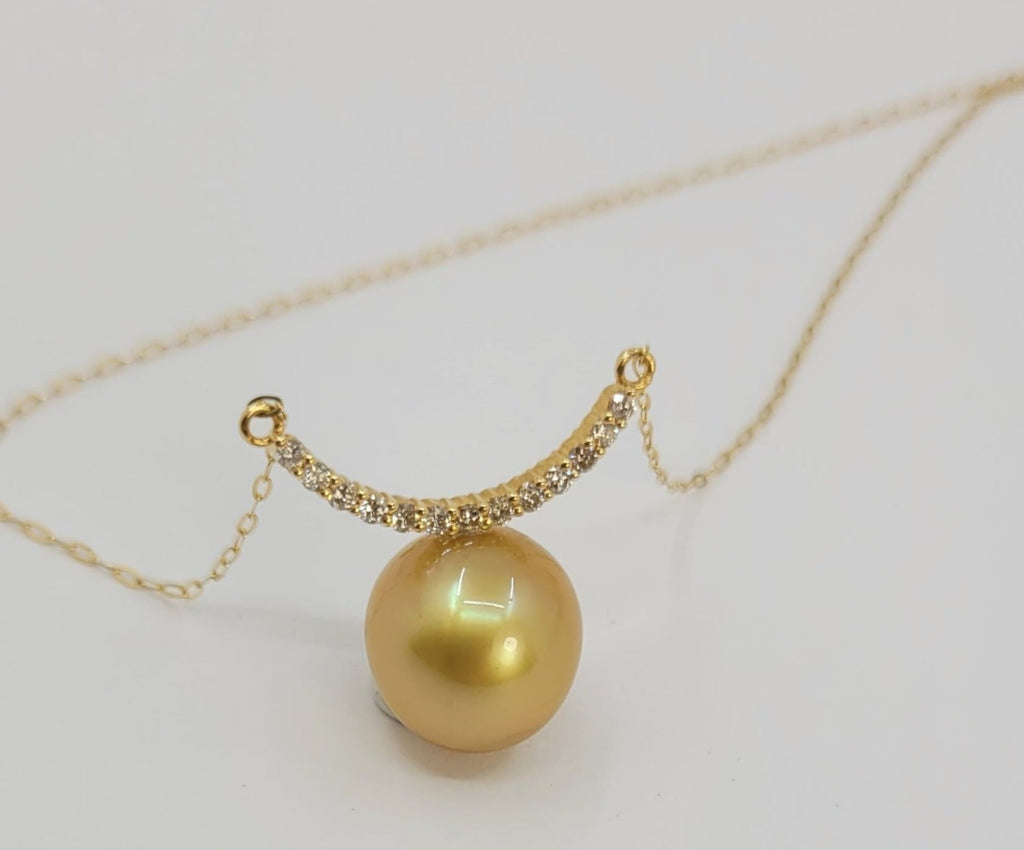 Collana in oro 18k e diamanti naturali 0.30ct  e perle australiana 10mm