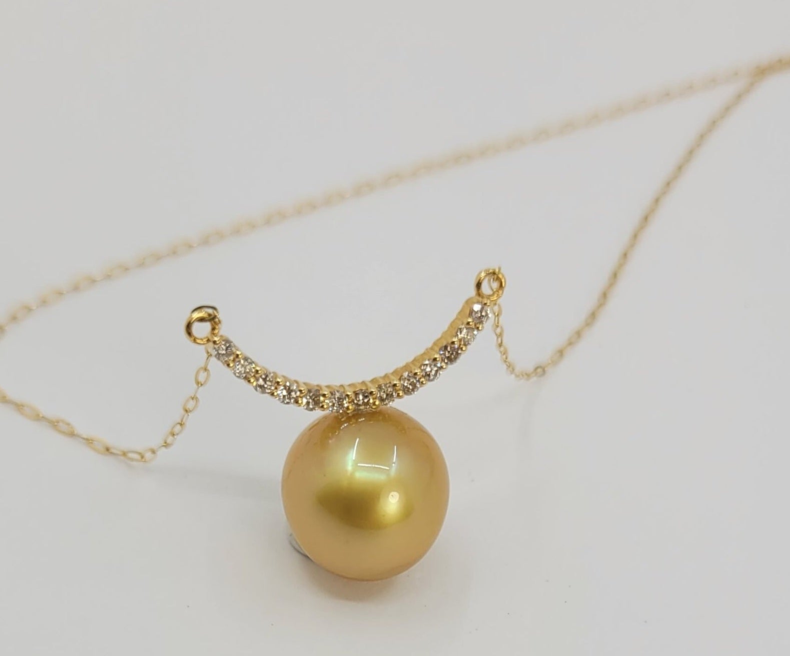 Collana in oro 18k e diamanti naturali 0.30ct  e perle australiana 10mm
