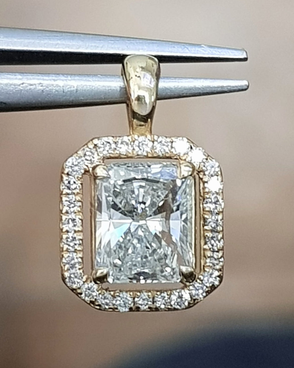 Ciondolo in oro  18k e diamanti naturali princess certificato IGI 1.36ct